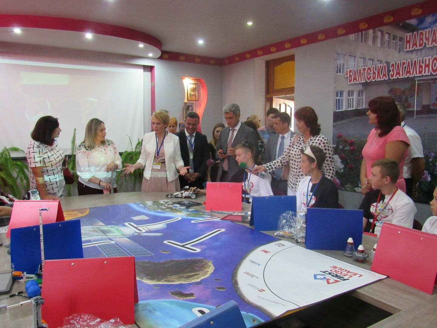 Liliya Hrynevych, Minister of Education of Ukraine, patronizes the educational process in the community. Students demonstrate skills in robotics. (2018) 