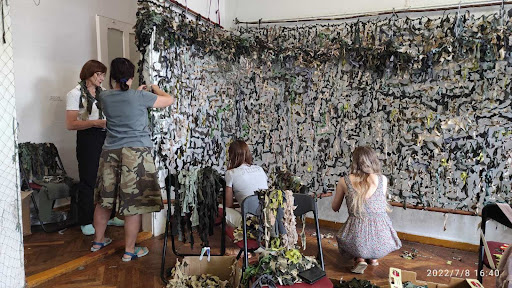 Camouflage nets woven by volunteers in the art museum for the Armed Forces of Ukraine