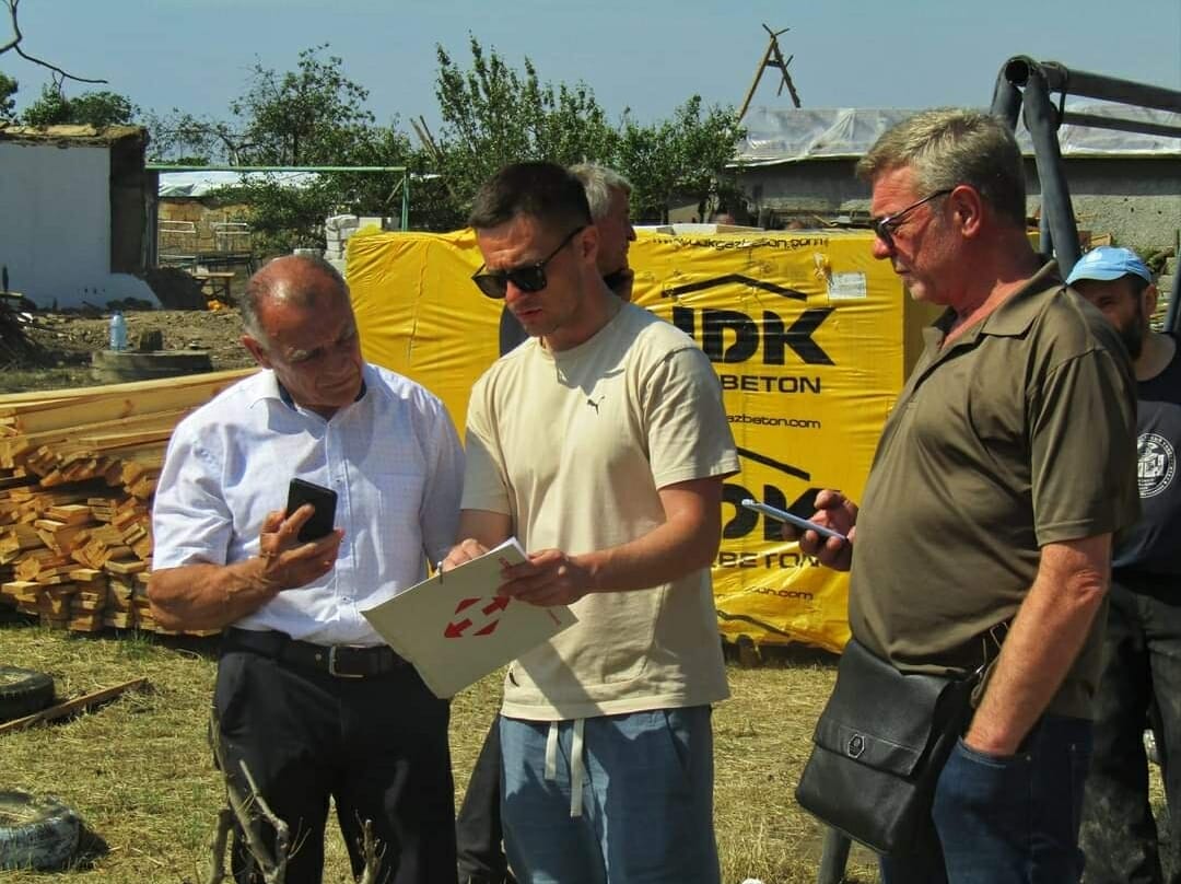 Serhiivka Community Head with his colleagues