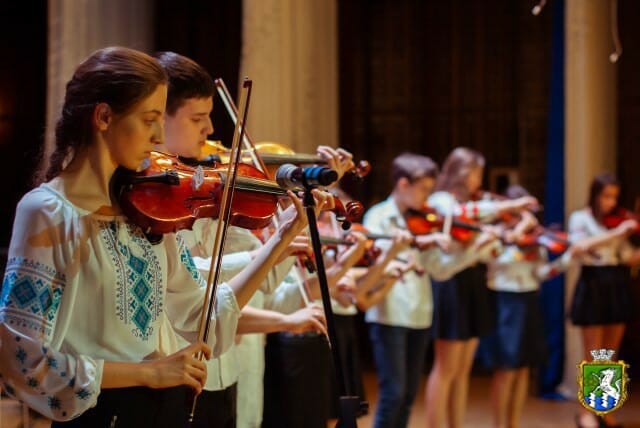 Performance of musicians on stage at the Enerhetyk Palace of Culture 