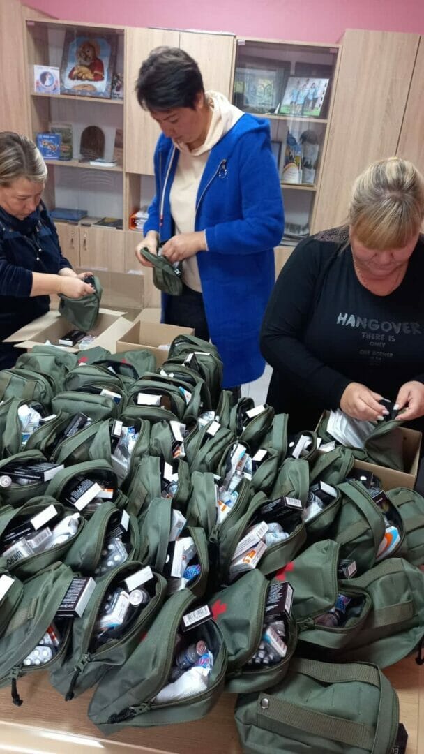 Preparing first-aid kits for the soldiers on the front line