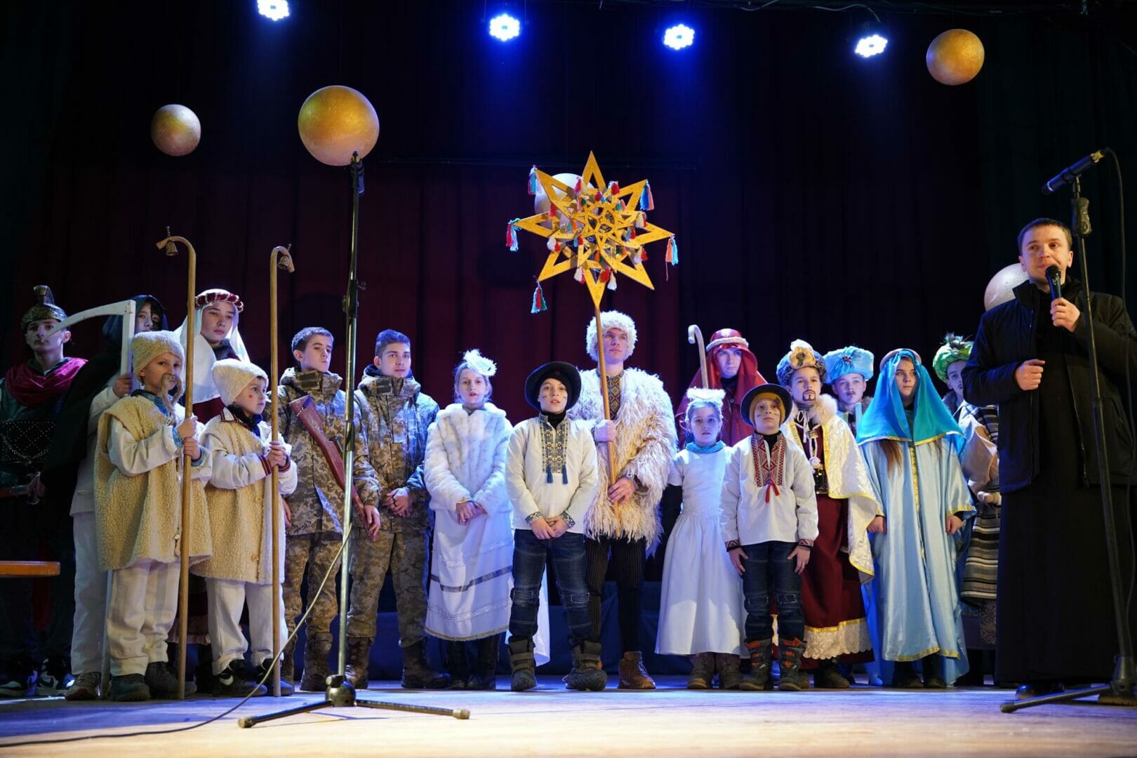 A Nativity play organized by community residents and displaced children to collect funds for two cars for the military