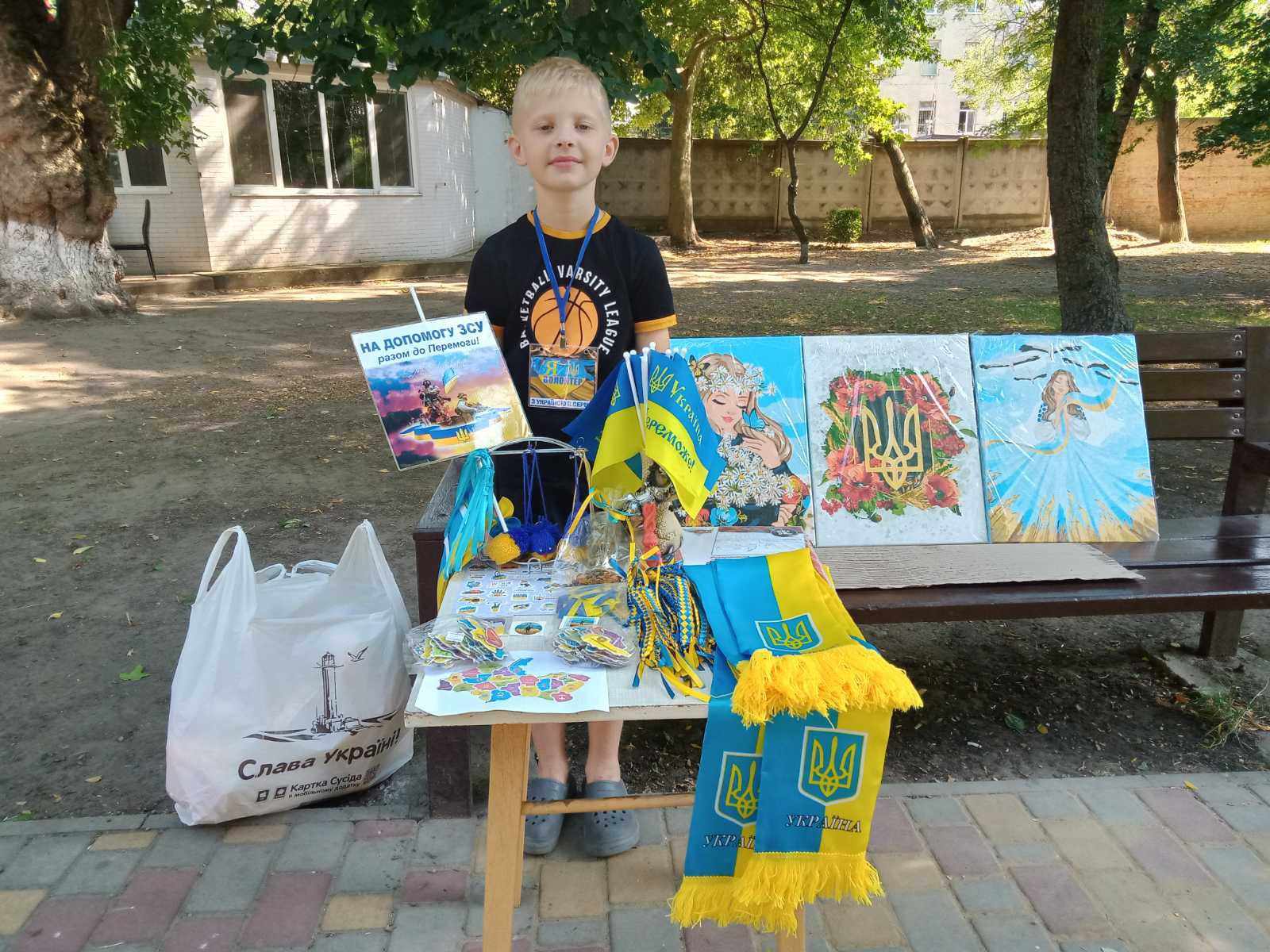 Little volunteer Vlad who collects funds for the Armed Forces