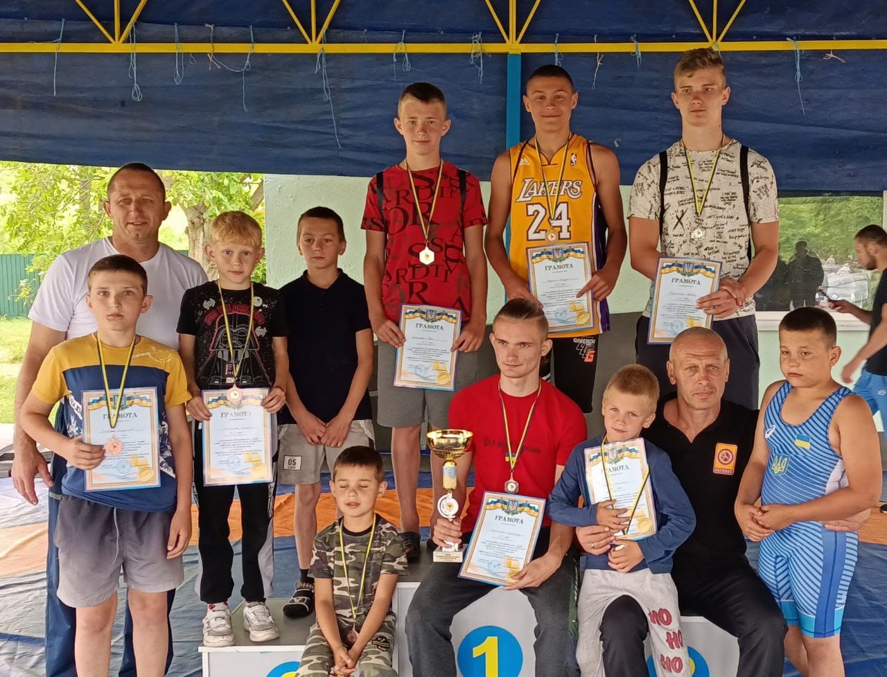 Community Head together with the winners of the Greco-Roman wrestling tournament 