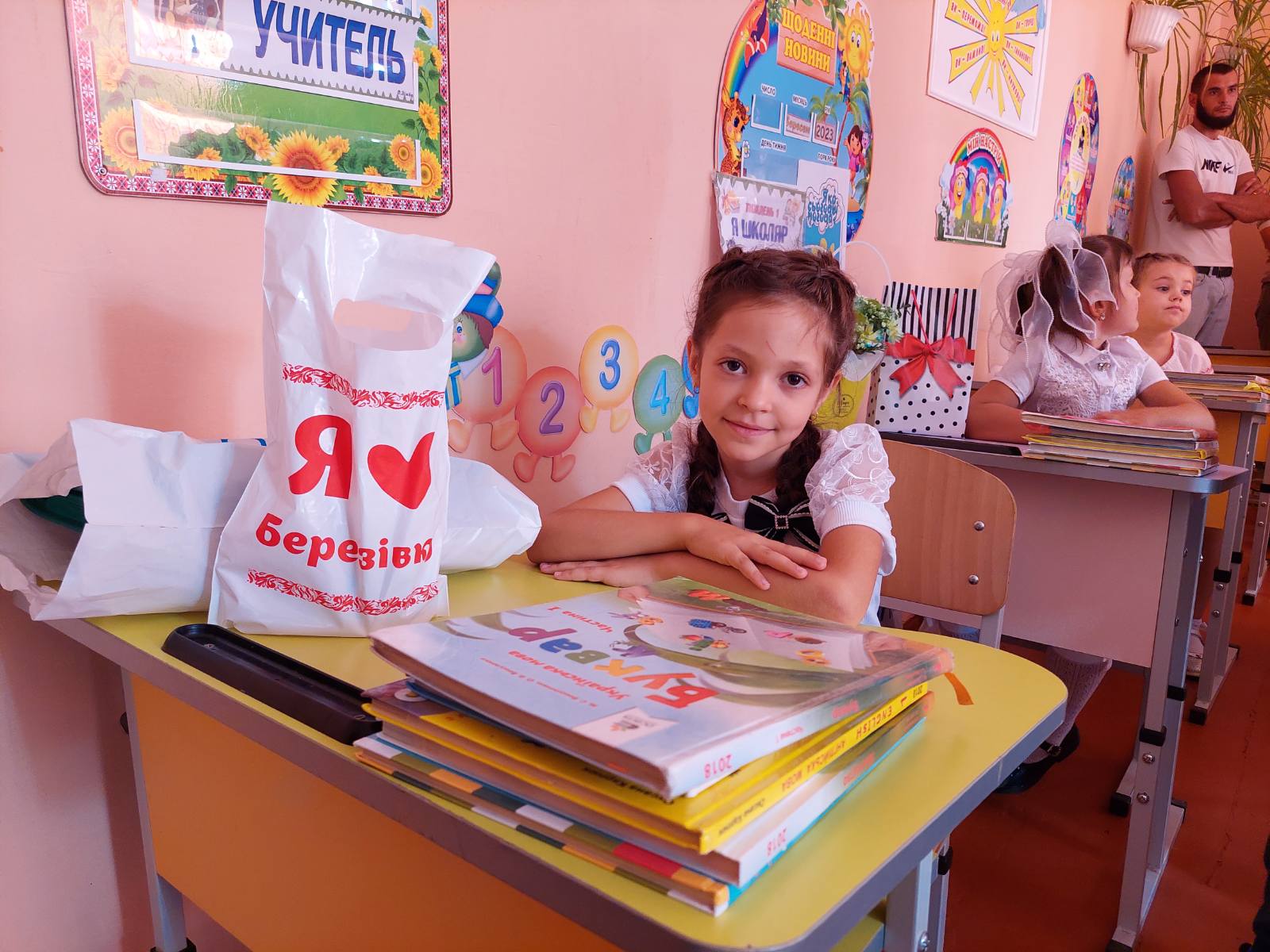A first-grader with a branded gift