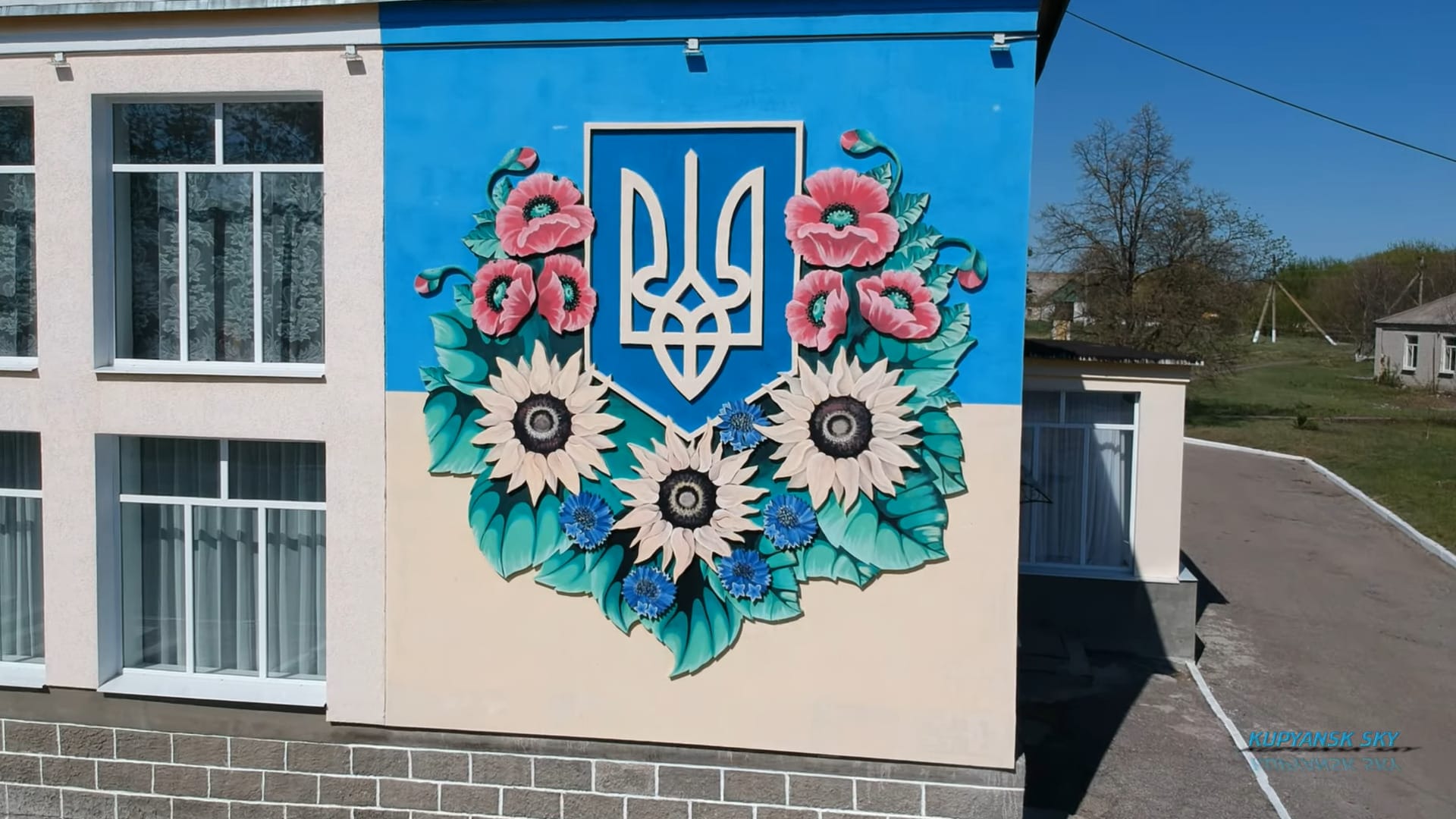 Patriotic bas-relief on the facade of the Petropavlivka Culture Centre