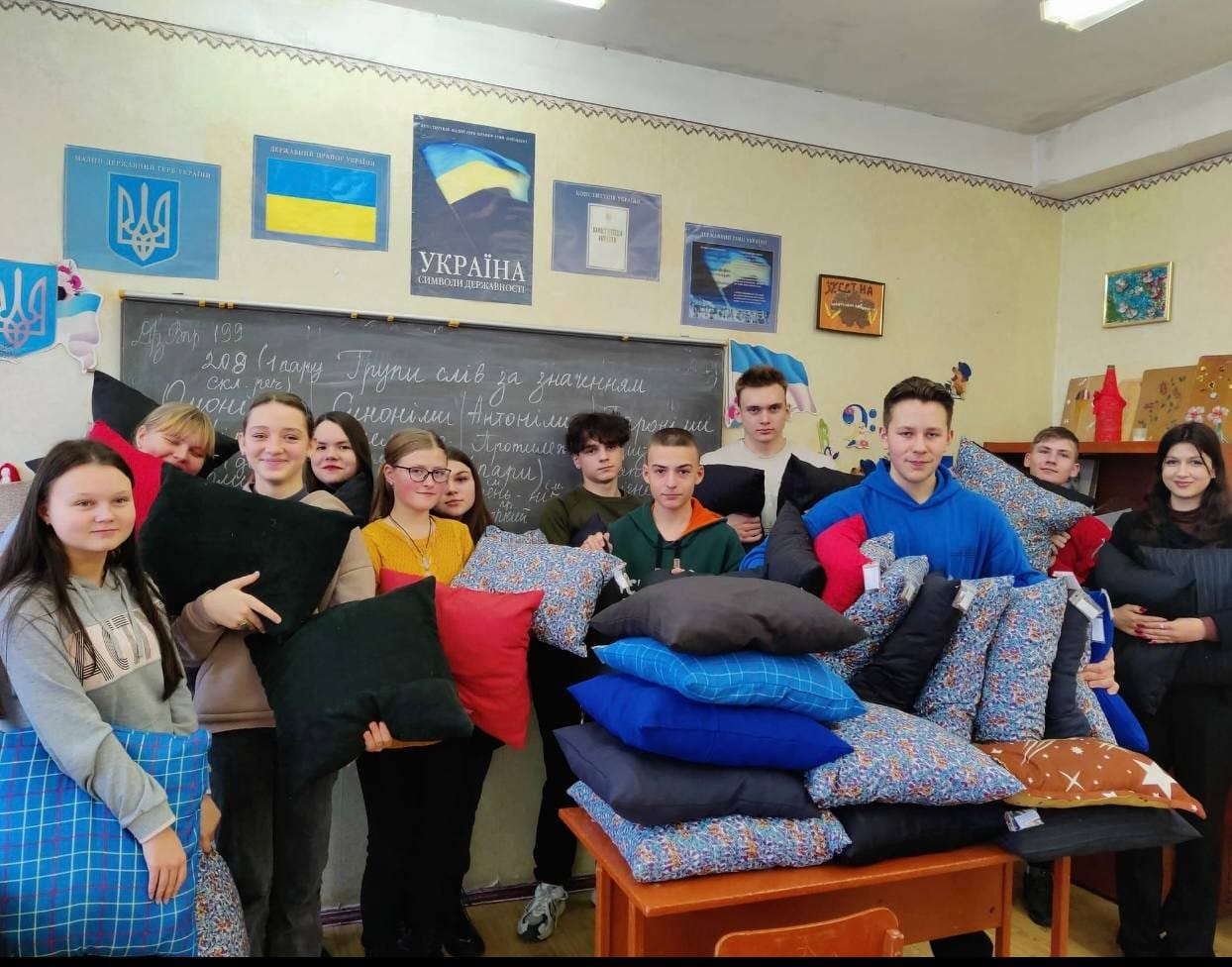 Berezan Lyceum No. 4. 10-A form students making cushions for the Ukrainian military