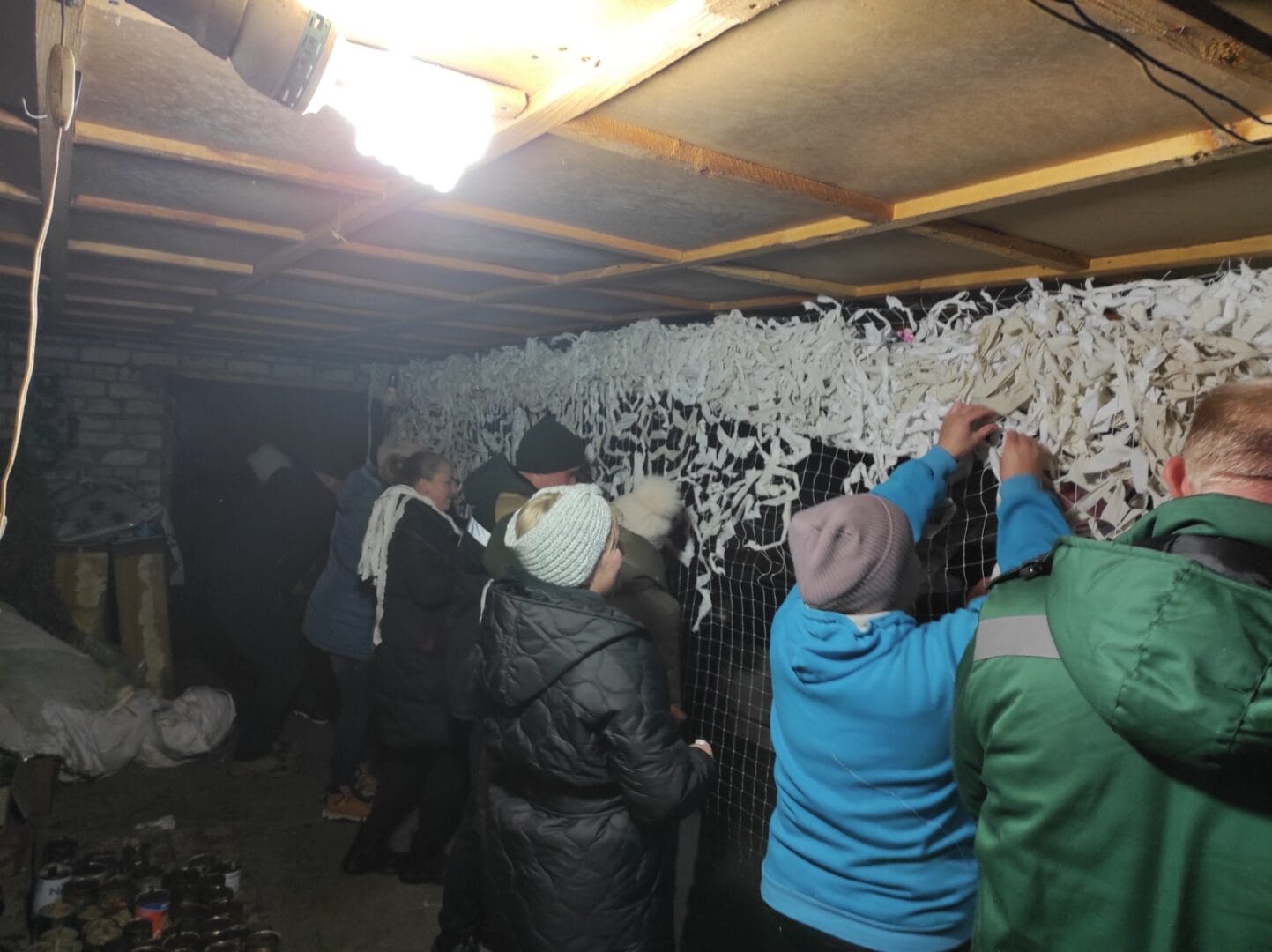Residents of the village of Sakhny and the village of Bondari weaving camouflage nets for soldiers of the Armed Forces of Ukraine