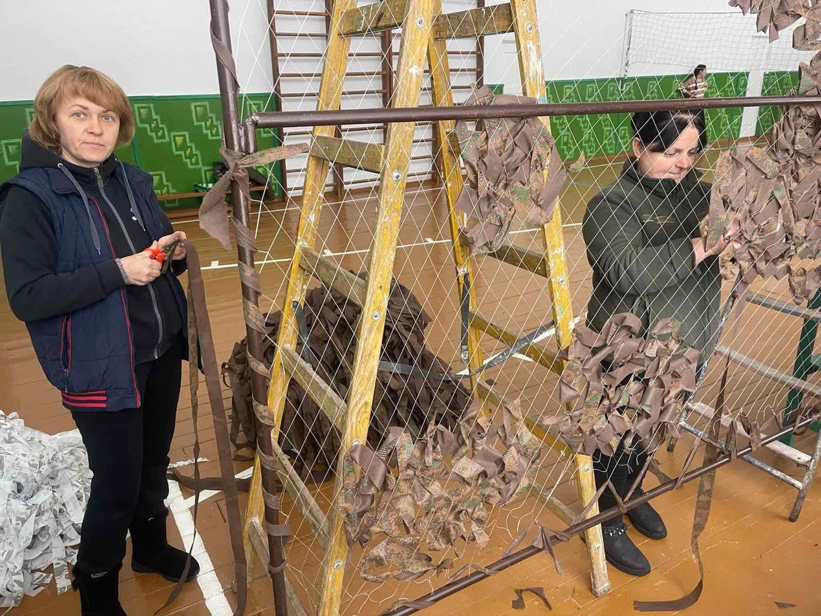 Women’s volunteer team weaving camouflage nets for the Armed Forces of Ukraine