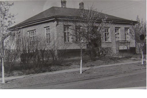 The building of the local parish school, later a printing house 