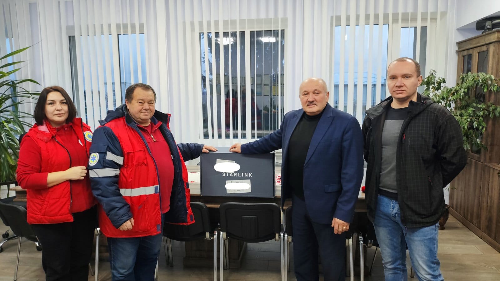The Head of the Community handing over Starlink to the staff of the emergency medical care department in the town of Kamianka