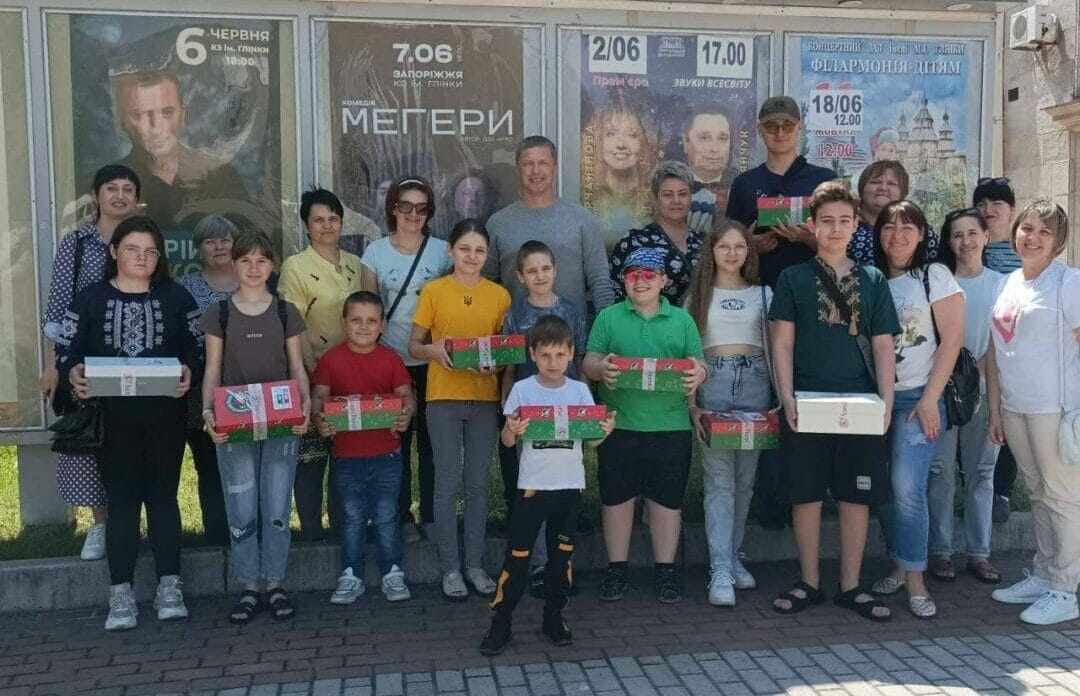 Children of the Velyka Bilozerka community attending a performance in the regional circus of Zaporizhzhia