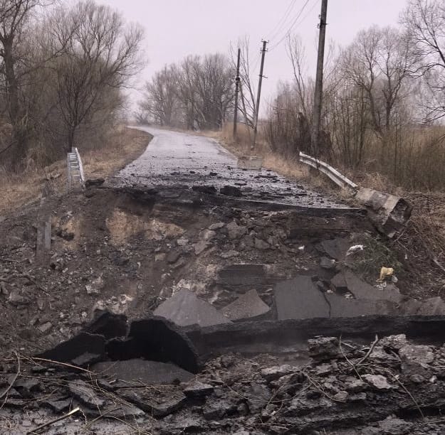 Destroyed bridge in the town of Koryukivka