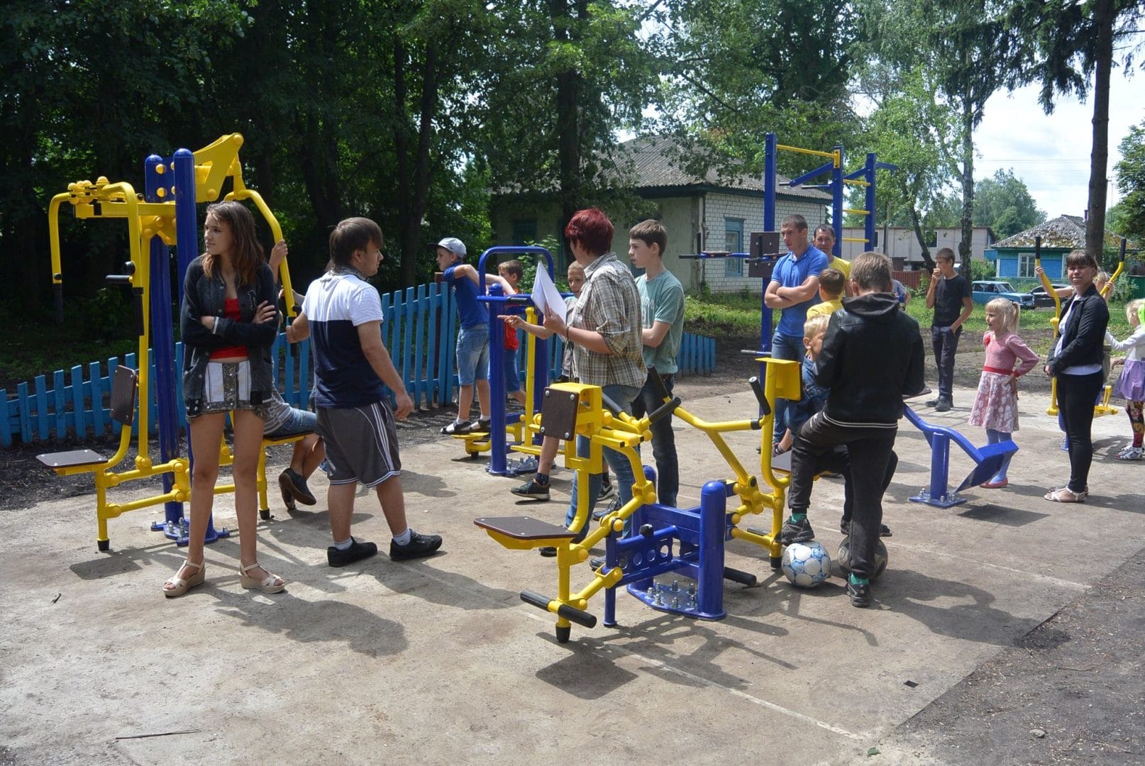 A playground with outdoor exercise machines for community residents