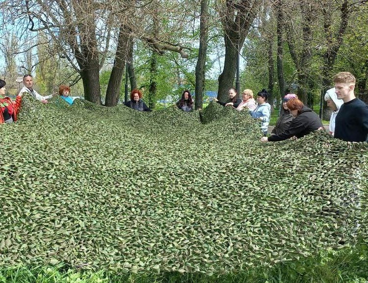 A large camouflage net made by the volunteers of Chornomorsk