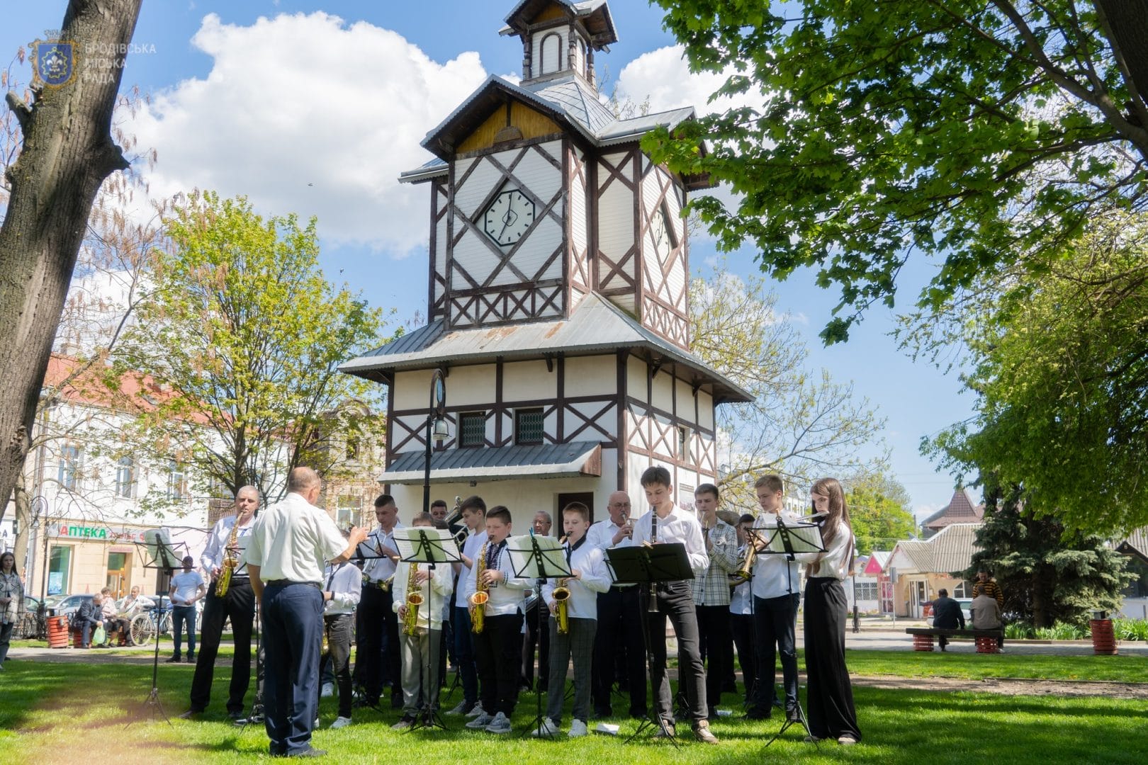 Performance by the brass band of the Brody school in the town park