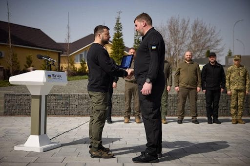 President of Ukraine Volodymyr Zelenskyi and Irpin Mayor Oleksandr Markushyn during the presentation of the award and awarding of the title of “Hero Town” to Irpin