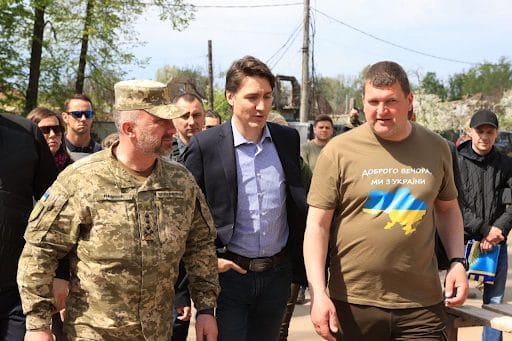 Canadian Prime Minister Justin Trudeau and Irpin Mayor Oleksandr Markushyn during a visit to the town after de-occupation, May 2022