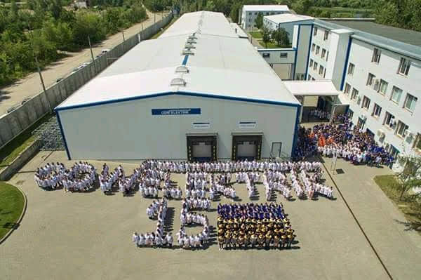 Photo of employees, taken at the celebration of the 15th anniversary of the plant