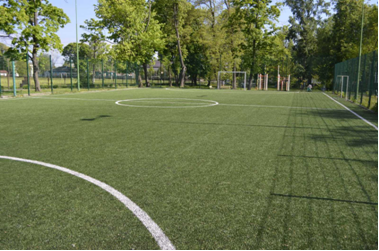 A mini-football field with artificial turf