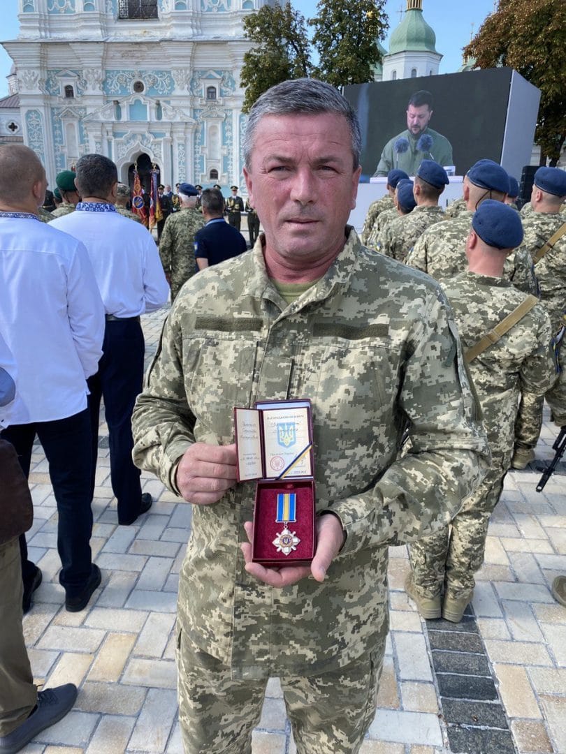 Awarding Community Head Oleksandr Prokopenko with the order “For Courage - III degree”. Sofiivska Square in Kyiv, August 2023.