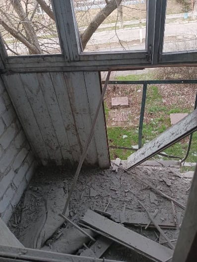 Damaged apartment buildings and residential buildings after russian shelling 