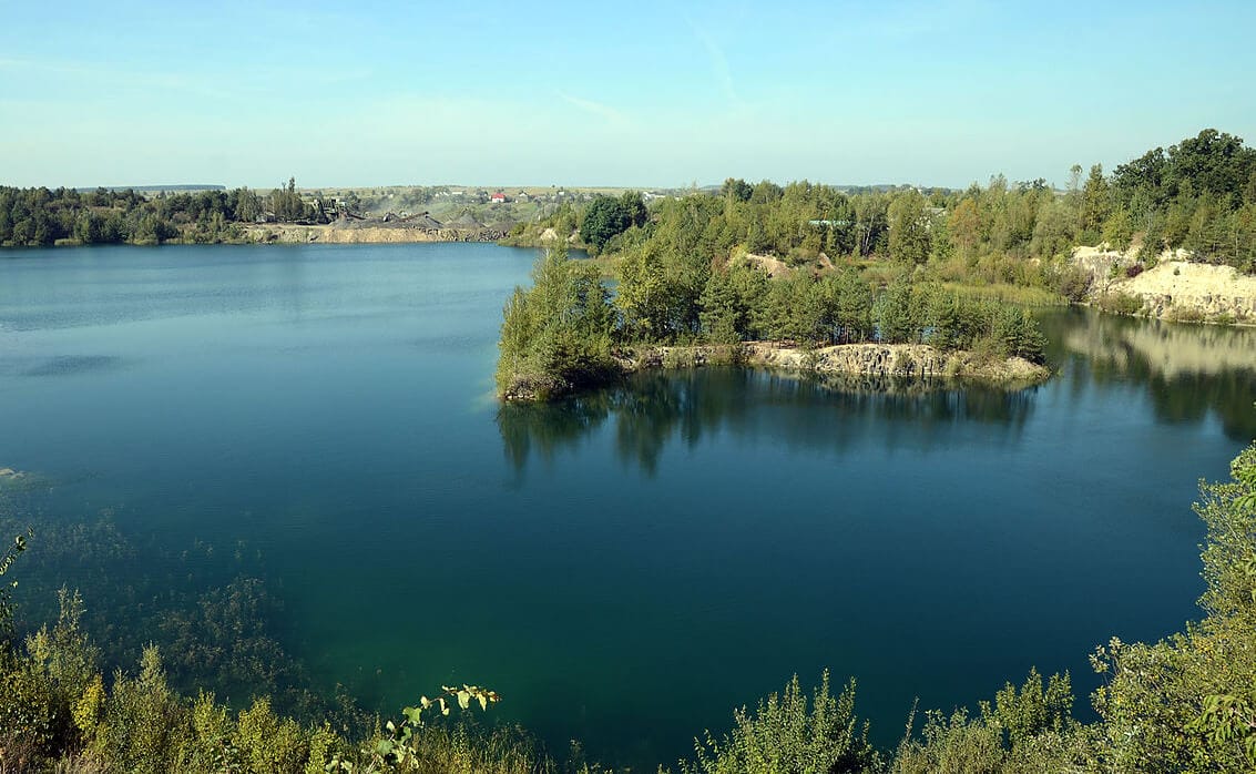 The depleted quarry flooded with underground water