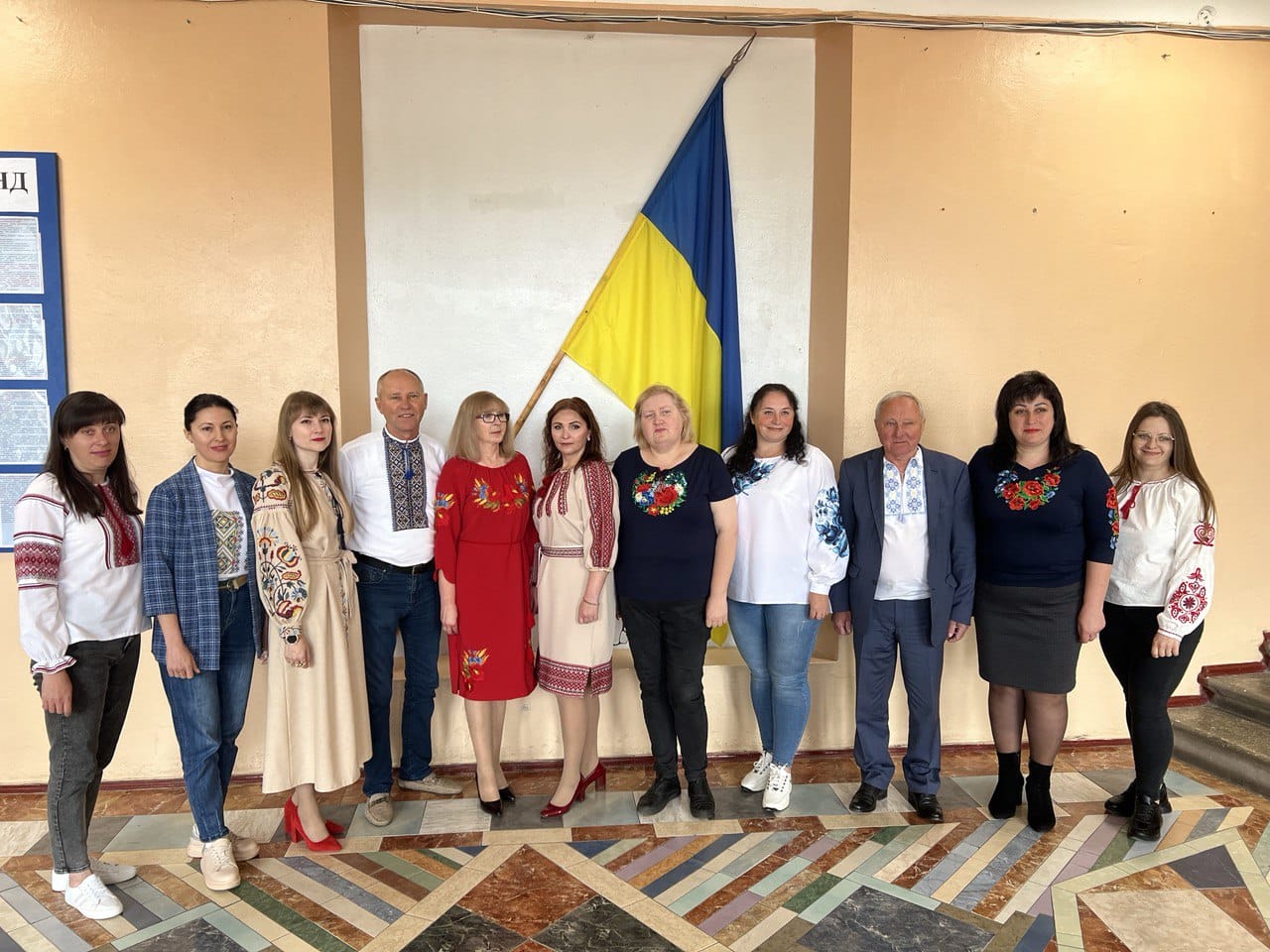 Community leader (fourth from left) and management team
