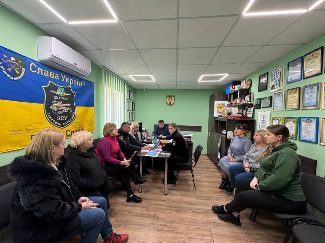 Community head at a working meeting
