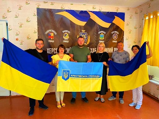 Oleksandr Skorobohatyi (centre) with the administration staff