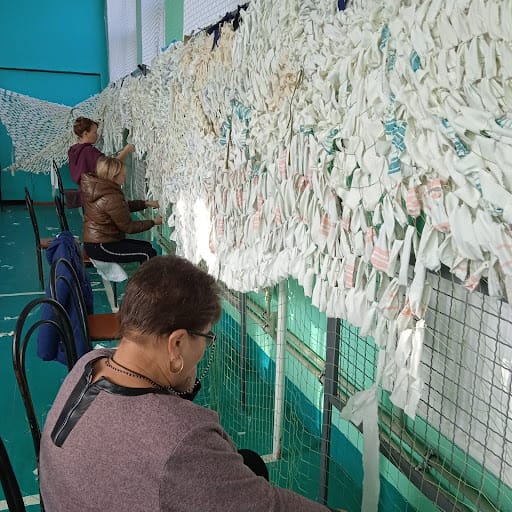 Local residents weaving camouflage nets for the Armed Forces of Ukraine