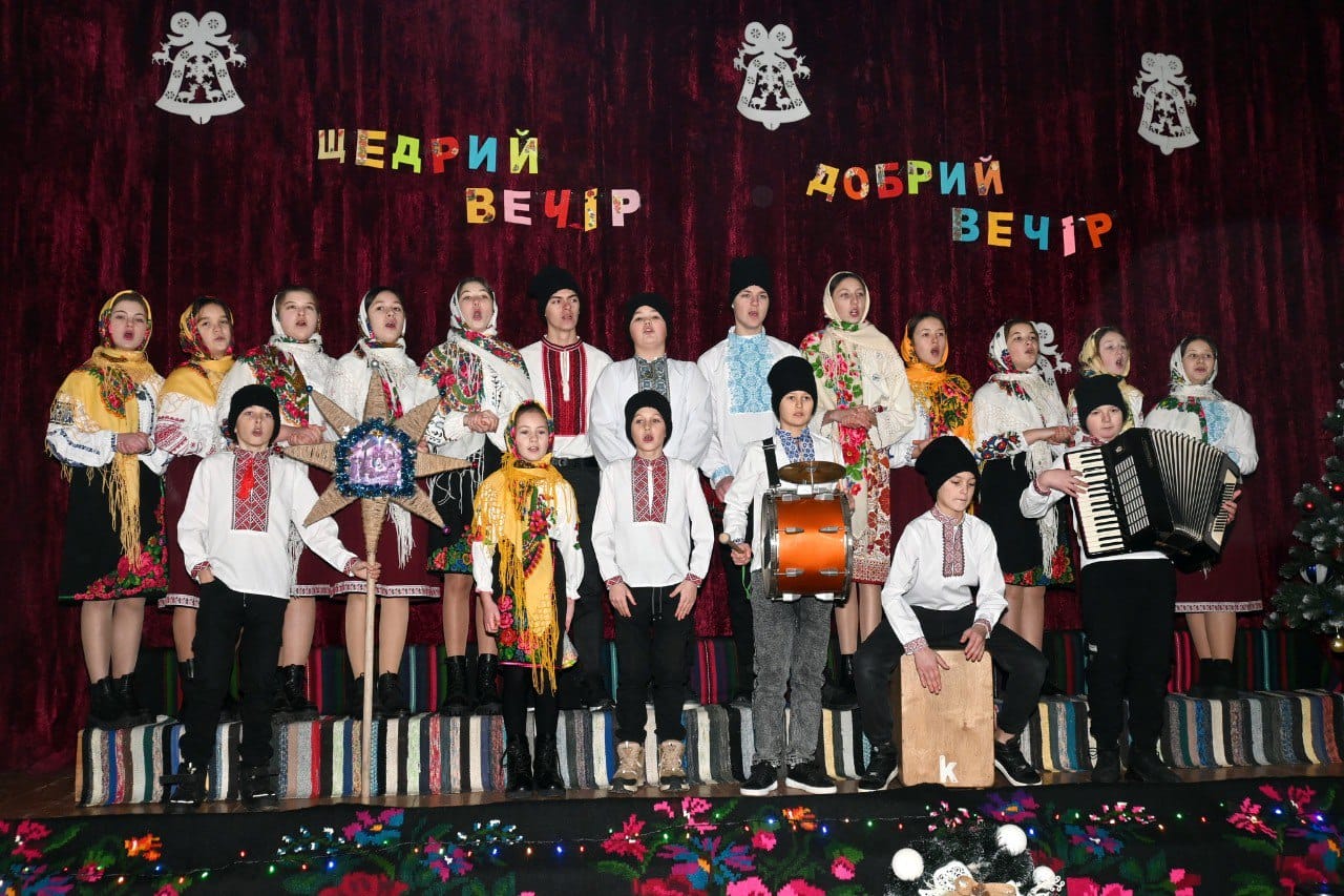Members of the Shyshkivtsi ensemble in traditional Ukrainian dress during a festive performance for Generous (Old New Year’s) Evening.