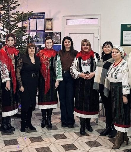 Acting Village Head Diana Kostiuk (in the centre) with Carol Singers